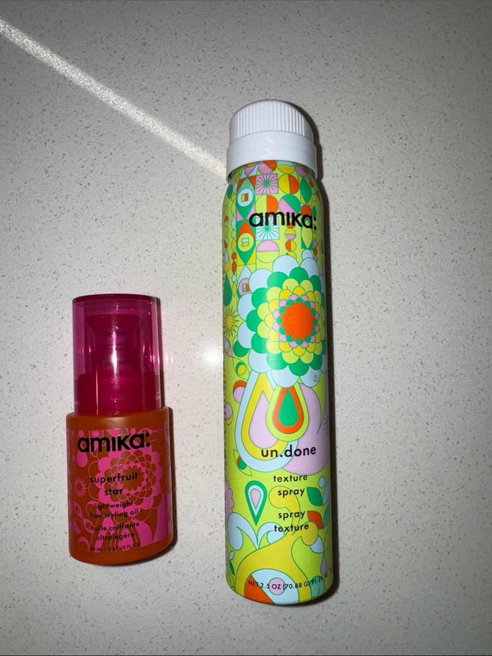 amika super fruit star and in•done texture spray travel size